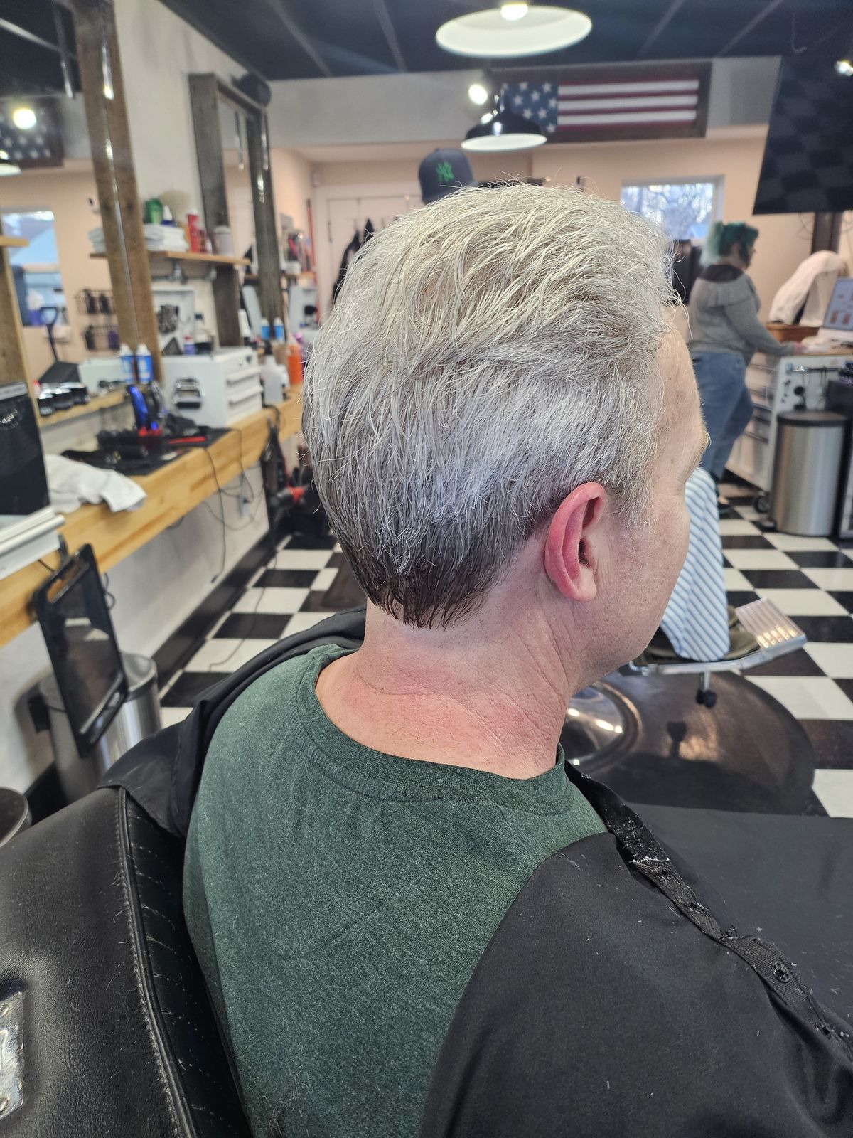 Clean scissor haircut by Kellie at Quincy Barbers