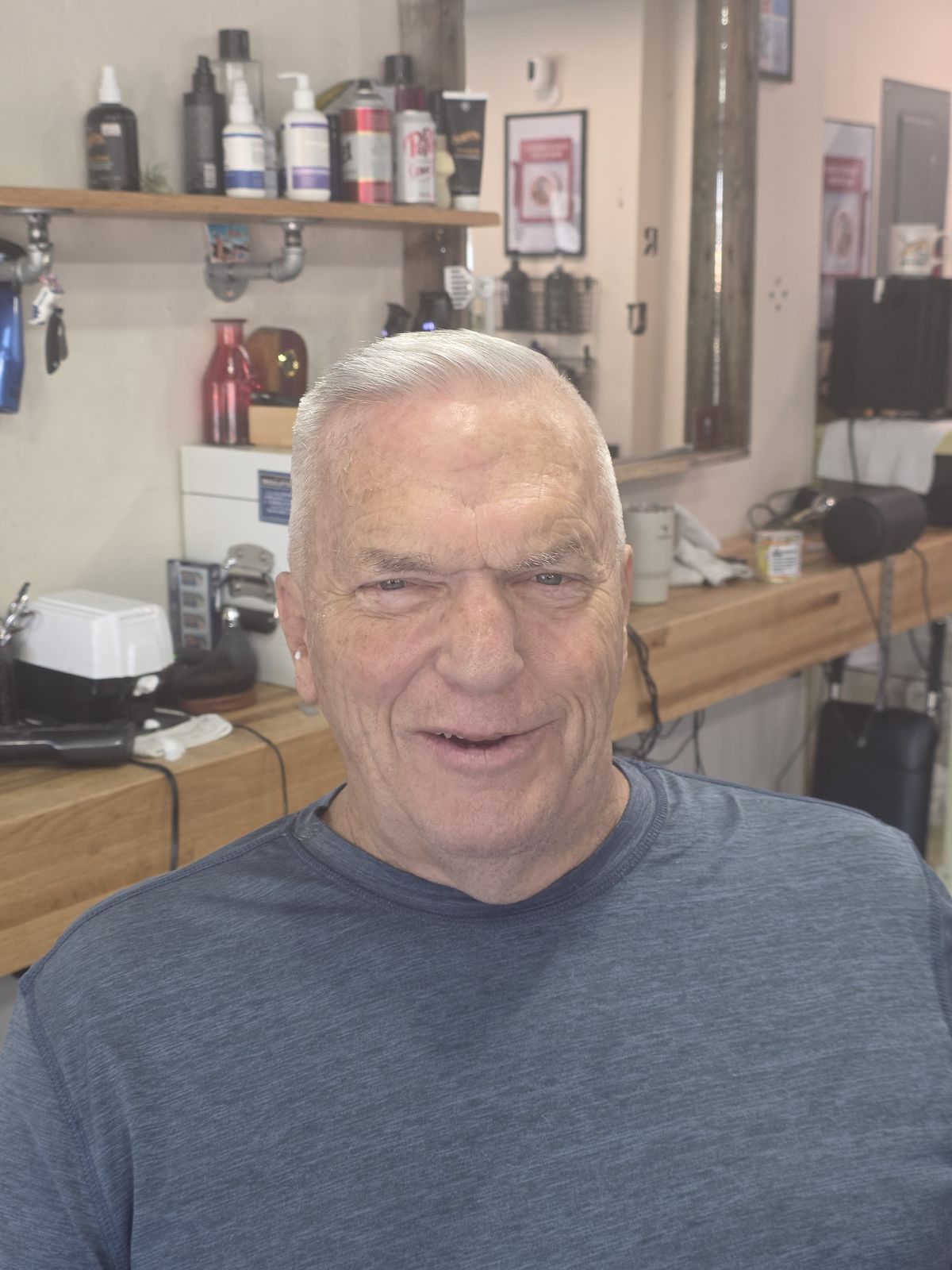 Classic short haircut at Quincy Barbers, Englewood
