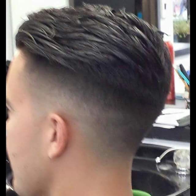 Low fade blowout haircut at Quincy Barbers